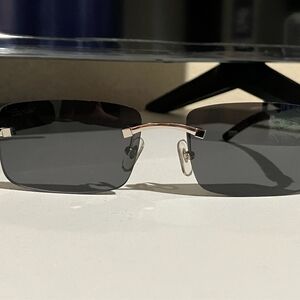 Cartier Black and Gold Rimless Sunglasses